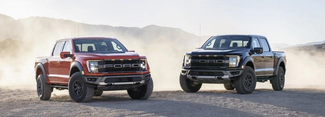 Two 2022 Ford F-150 trucks parked side by side