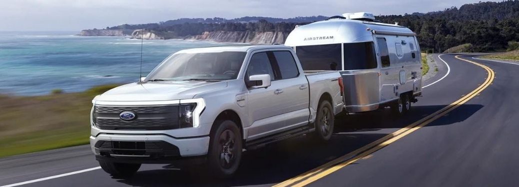 2022 Ford F-150 Lightning towing a trailer