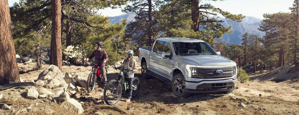 2022 Ford F-150 Lightning in a forest area