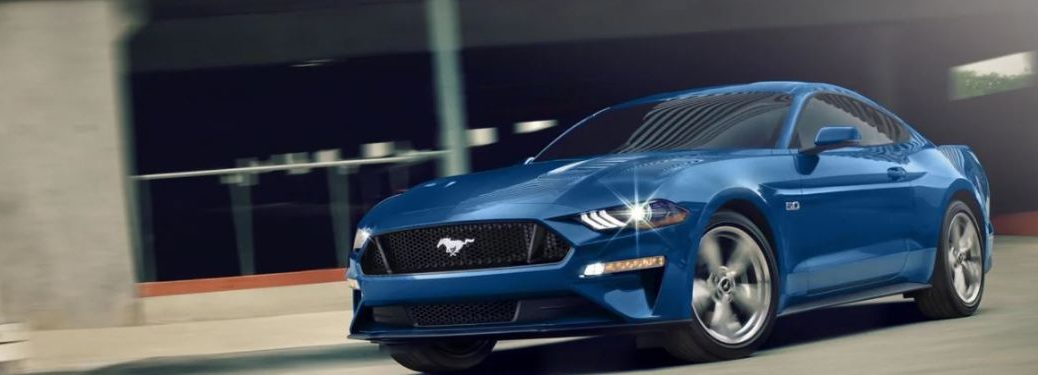 2022 Ford Mustang Blue driving on the road