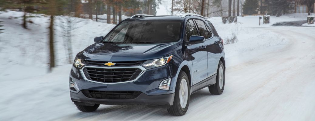 2018 Chevrolet Equinox driving in a snowy path