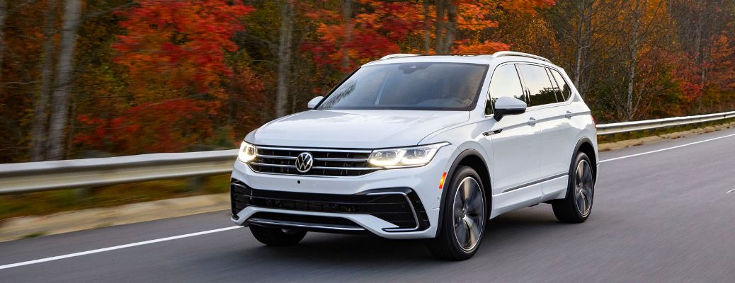 Front view of a 2022 Volkswagen Tiguan cruising on a road