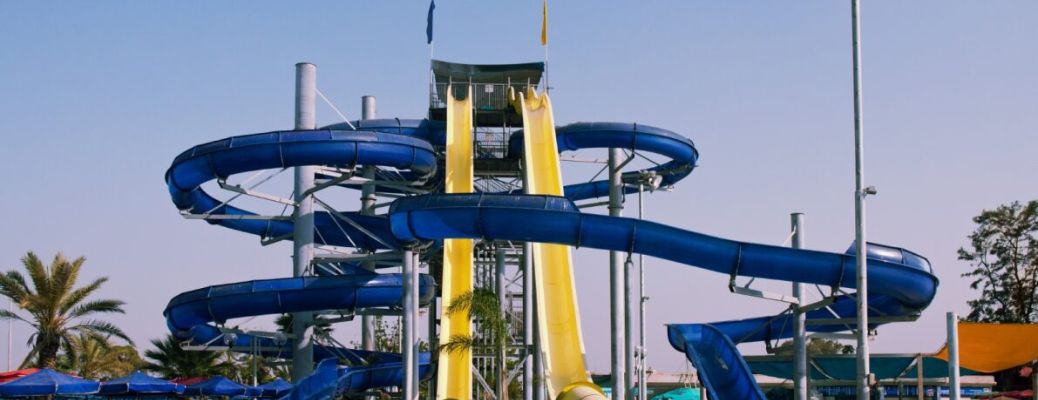 Water slide tower in a waterpark. Which are the Best Waterparks Near Topeka, KS