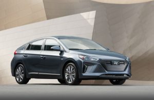 2018 Hyundai Ioniq Hybrid with an abstract background