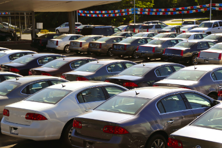 view of various of cars on car dealership lot