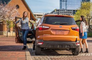 Two girls walking out of the 2019 ford ecosport