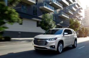 White 2020 Chevy Traverse on the road