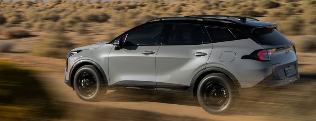 2026 Kia Sportage side view and rear view