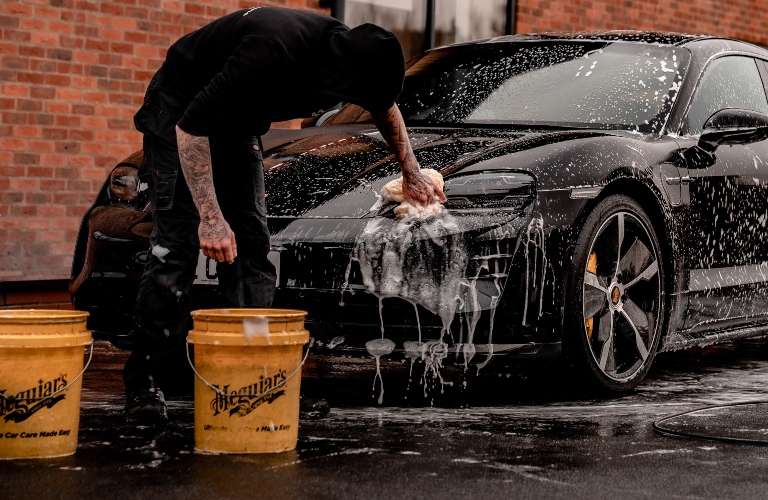 Man Hand-Washing Car