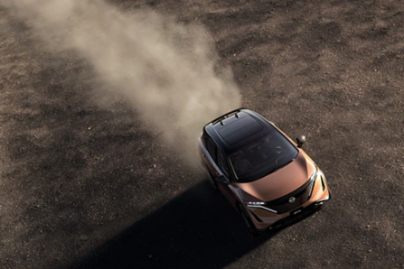 Top View of Nissan Ariya Driving in Dirt