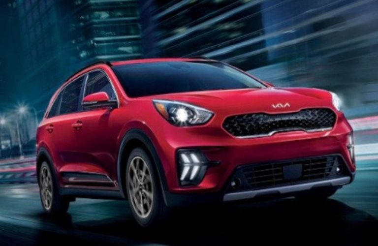 2022 Kia Niro driving through the city