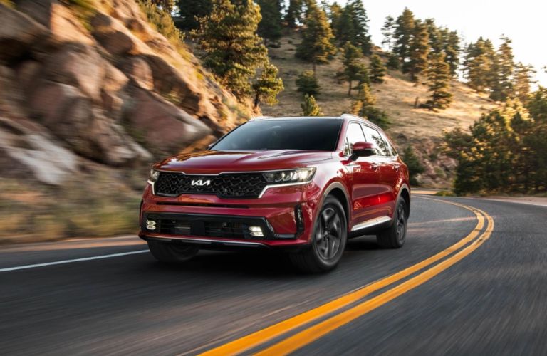 2023 Kia Sorento Hybrid driving on road