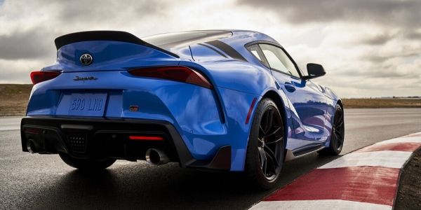Blue 2021 Toyota GR Supra A91 Edition Rear Exterior on a Track