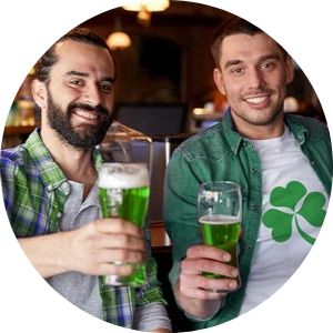 Two Men Drinking Green Beer at a Bar