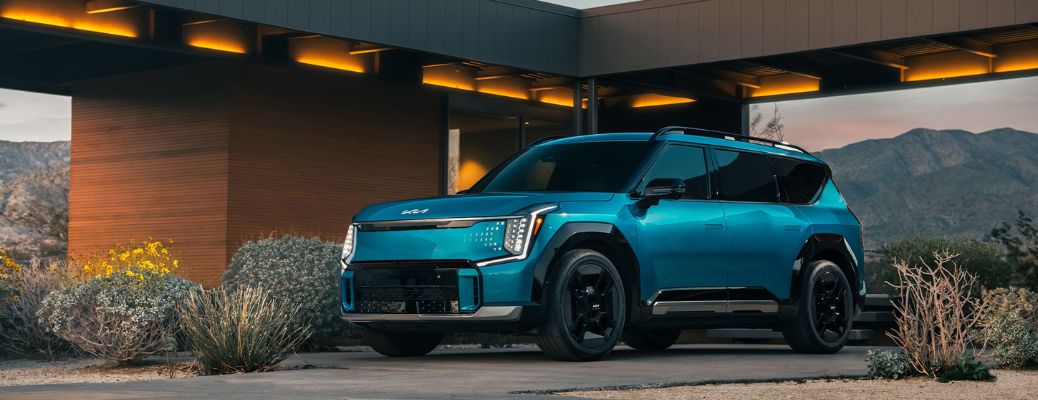 2026 Kia EV9 Blue parked outside the house