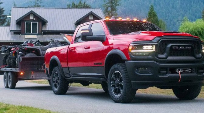 2023 Ram 2500 Rebel towing a trailer with bikes