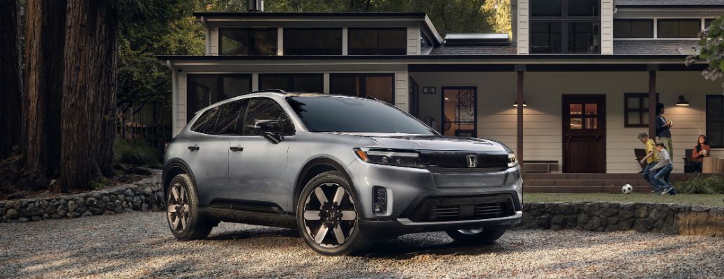 2025 Honda Prologue parked in front of a house