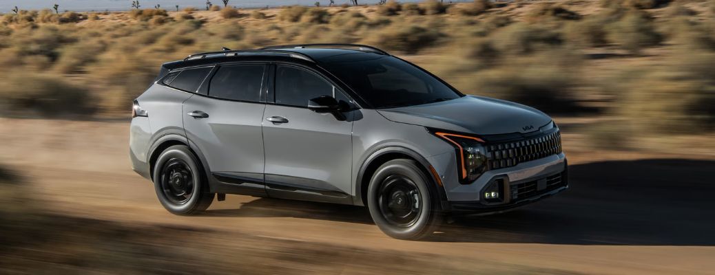2026 Kia Sportage on a dusty road
