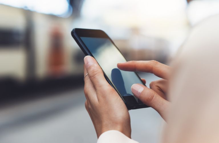hands using a smart phone