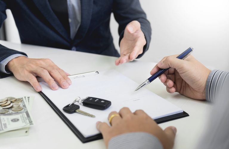 Hands of two men with documents