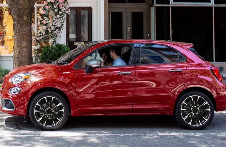 Side view of the 2023 Fiat 500X in red