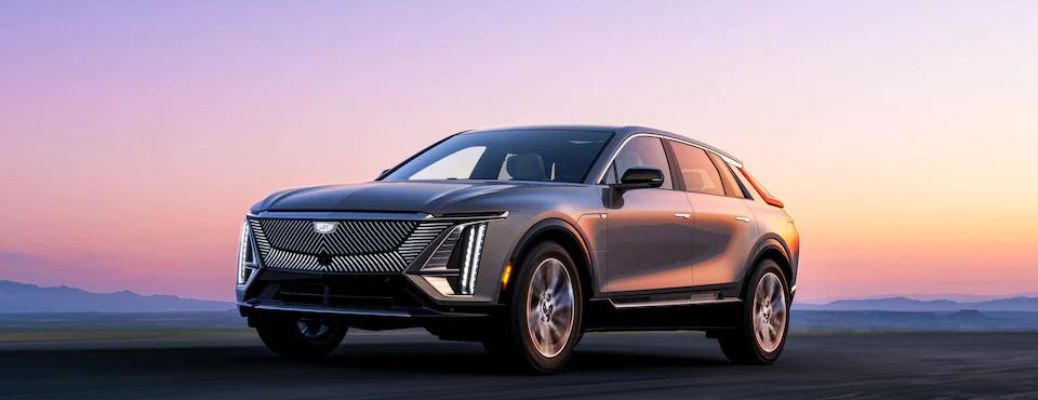 2023 Cadillac LYRIQ with a sunset view on the background