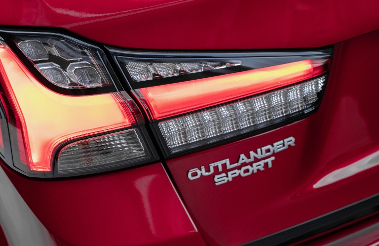 Red 2023 Mitsubishi Outlander Sport Rear Badge