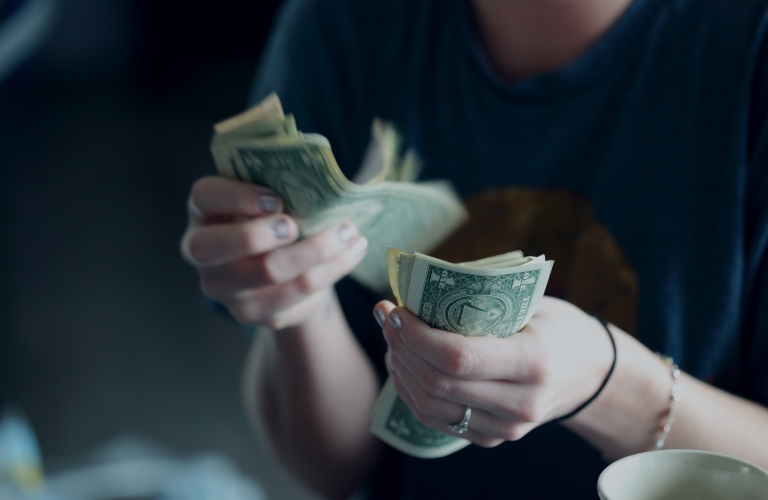 Woman Counting Cash