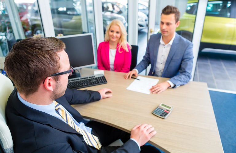 a couple understanding the terms from a finance specialist