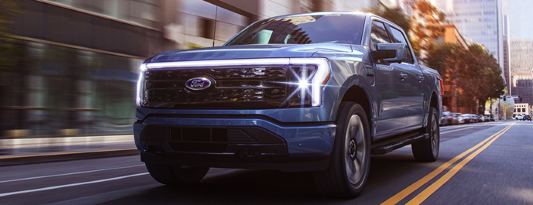 2022 Ford F-150 Lightning front view on a road
