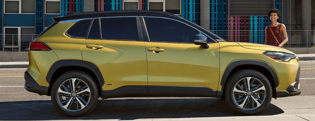 2023 Toyota Corolla Cross Hybrid side view in yellow